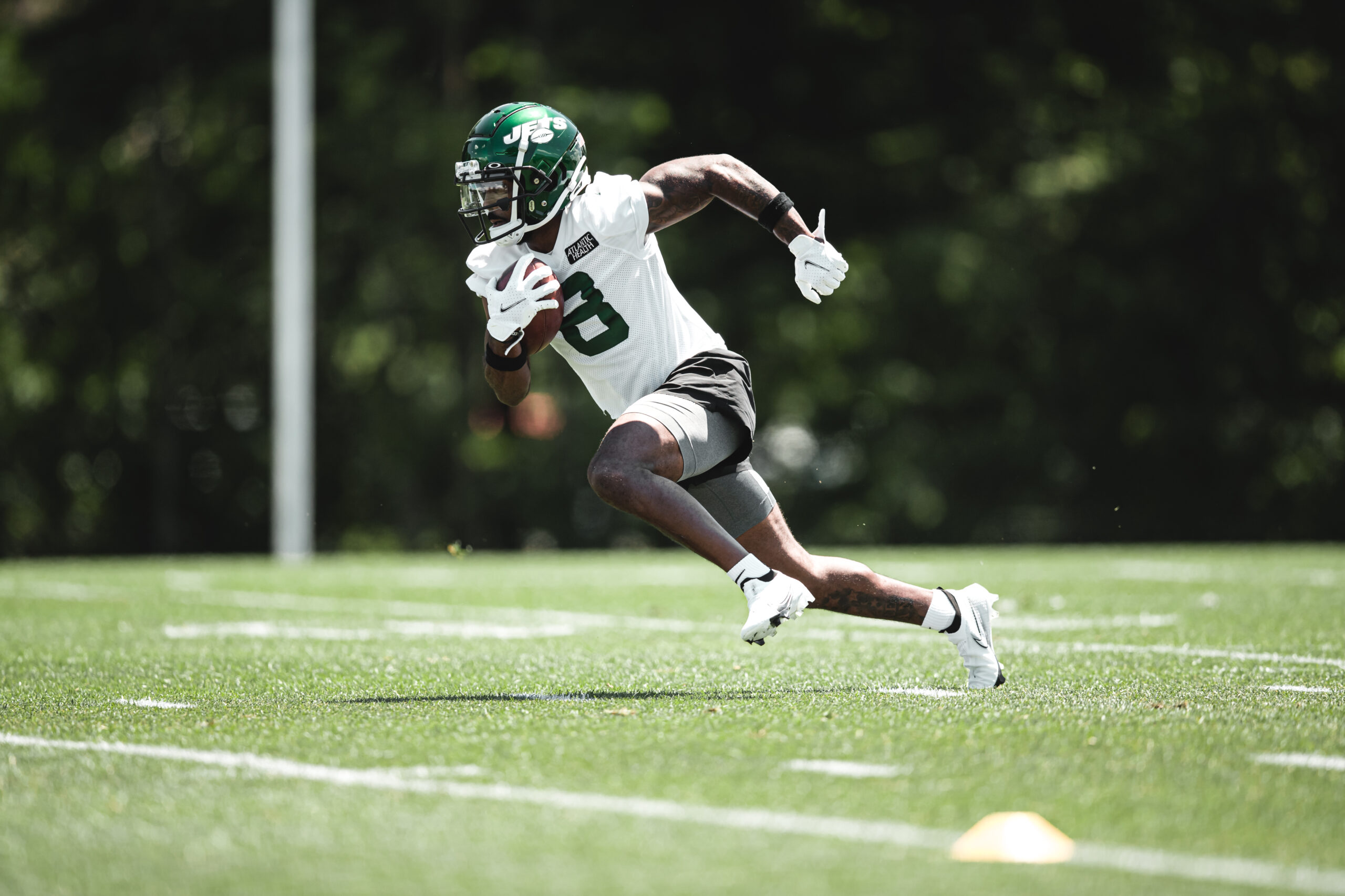 New York Jets Football number 8 running the ball