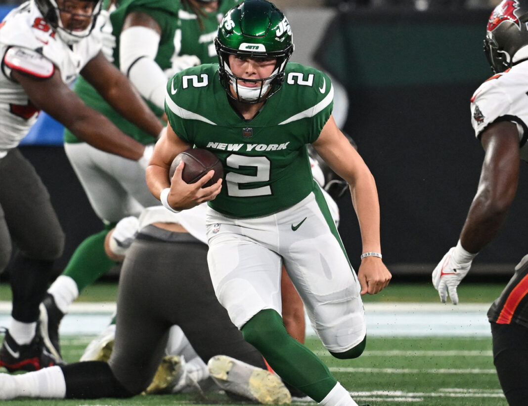 New York Jets Football Zach Wilson Running